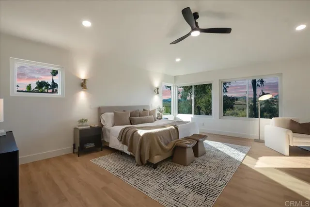 a bed room with a bed and a window