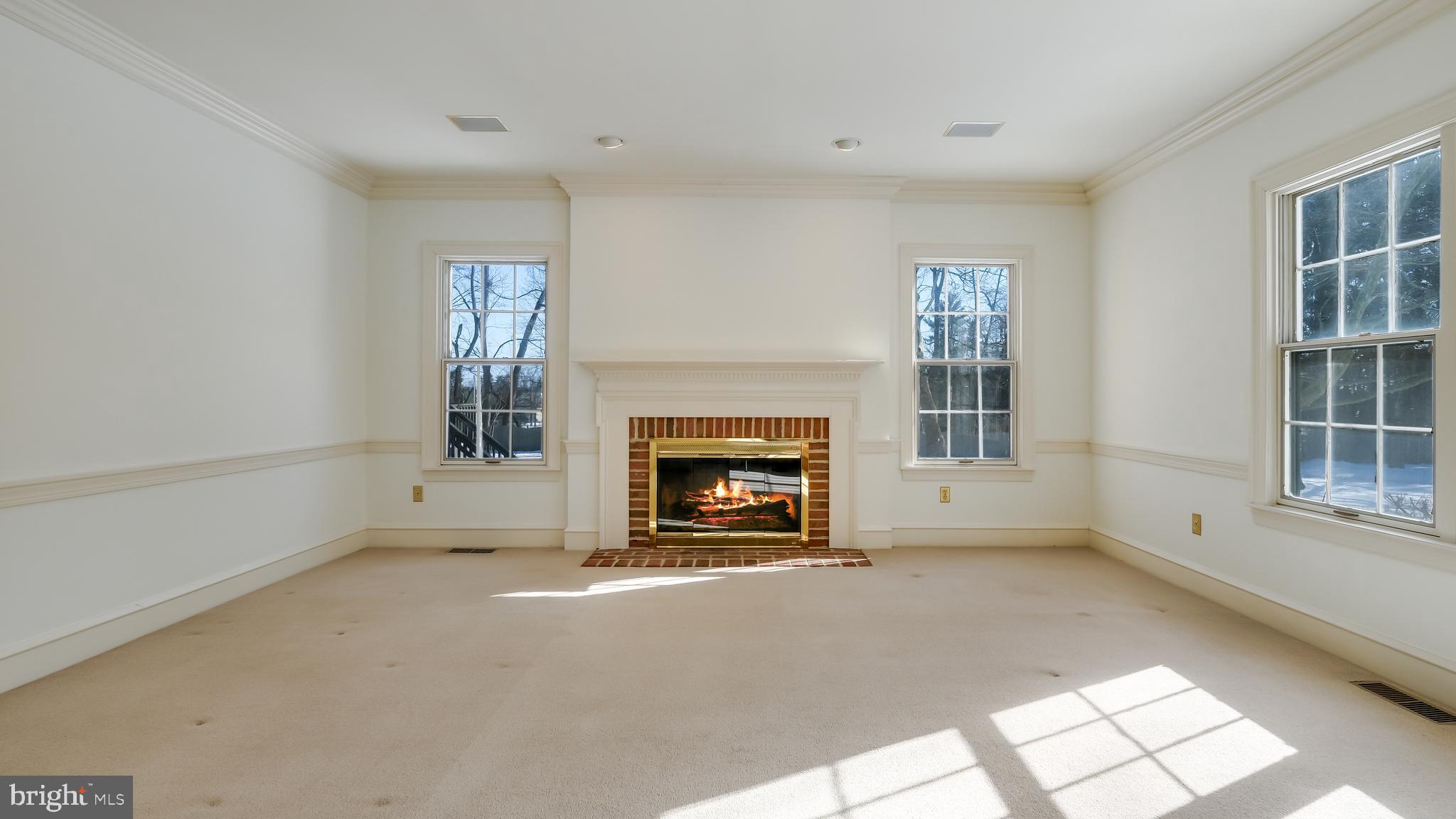 45 Latham Court Doylestown, PA 18901 - Photo 12 of 41 a view of an empty room with window and fire place