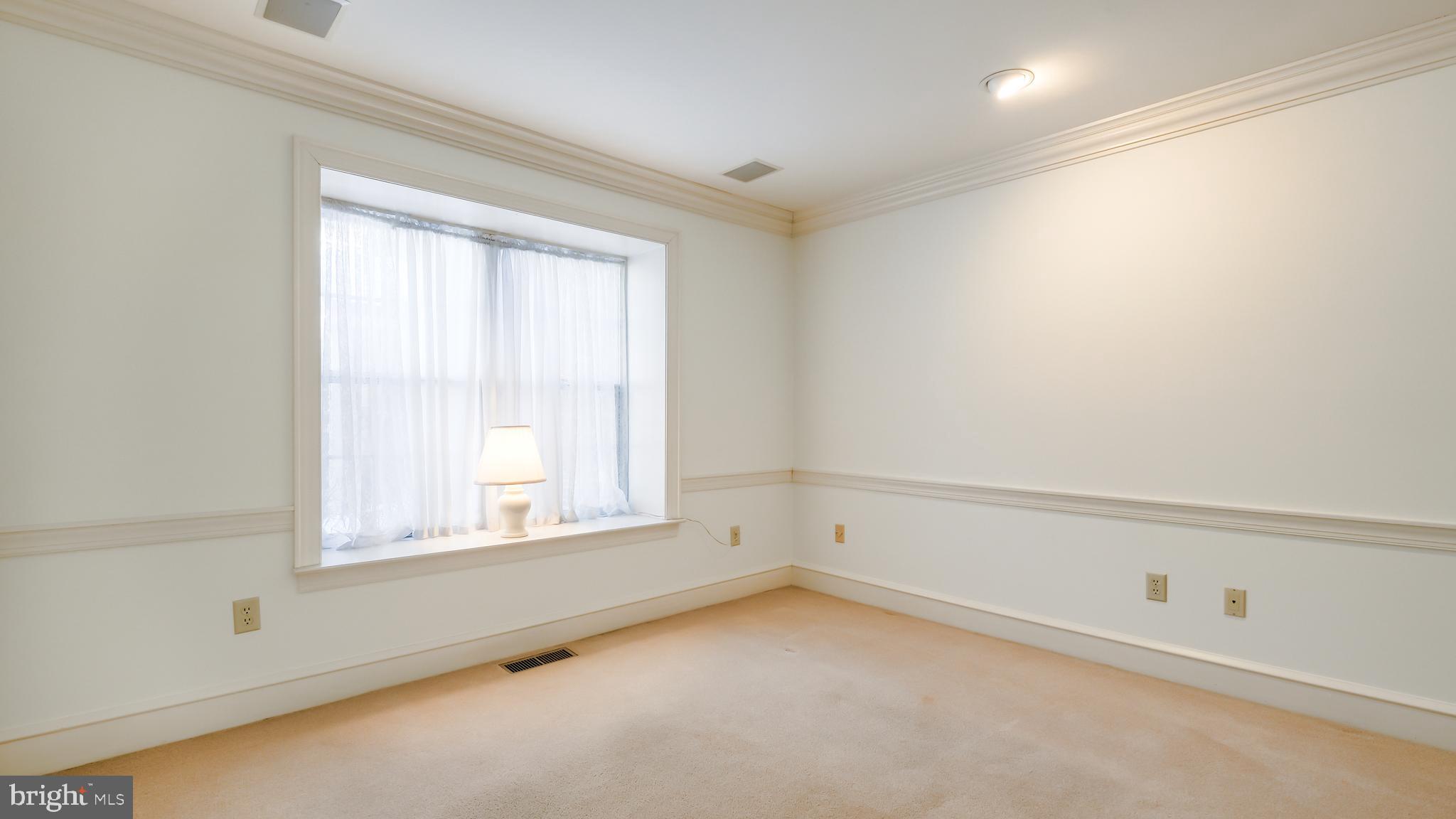 45 Latham Court Doylestown, PA 18901 - Photo 6 of 41 an empty room with a window