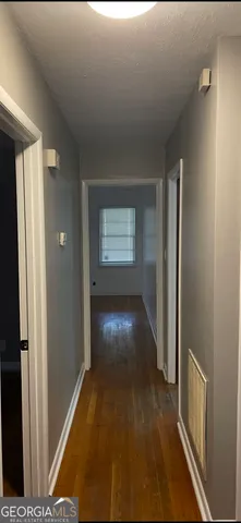 a view of an empty room and window