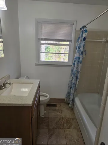 a bathroom with a toilet