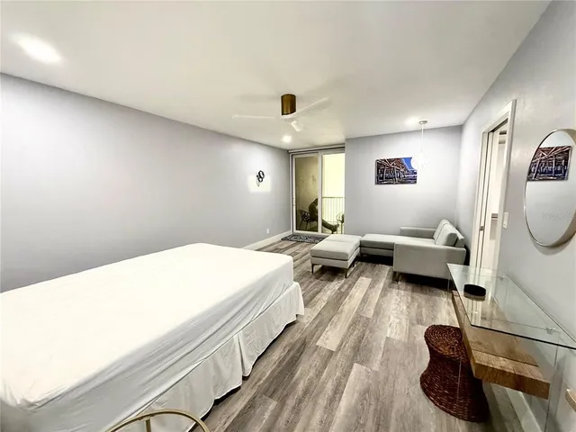 a bed room with a bed and a window