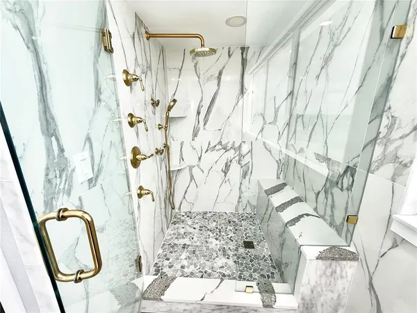 a bathroom with a shower curtain and a sink