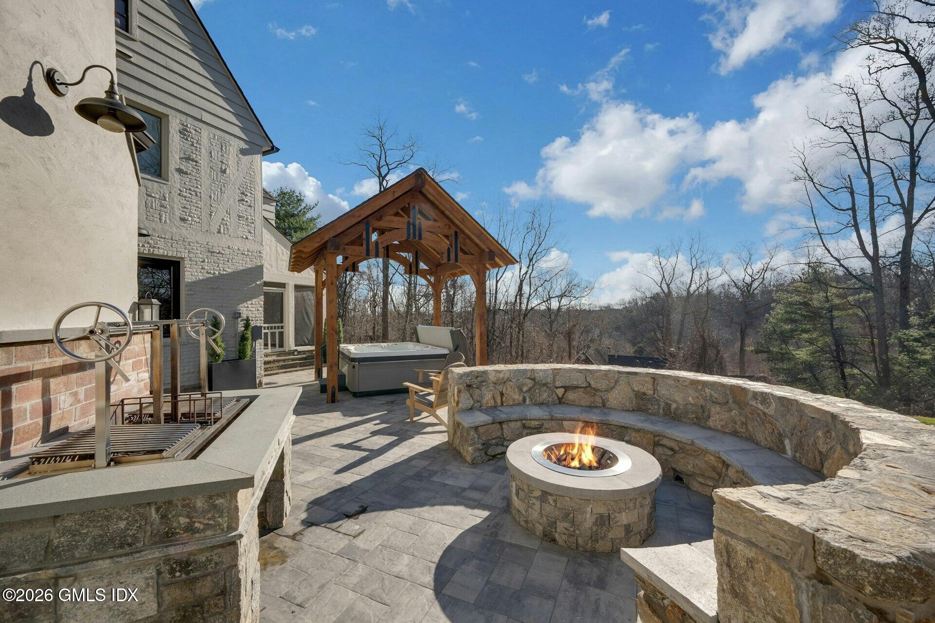 25 Wildwood Road Stamford, CT 06903 - Photo 34 of 42 hot tub and firepit
