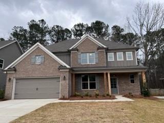 3856 Rajean Drive Lawrenceville, GA 30044 - Photo 1 of 1 a front view of a house with yard