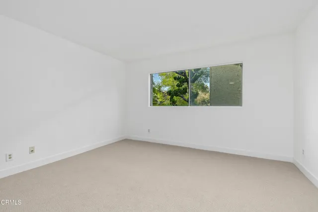a view of a bathroom from a hallway