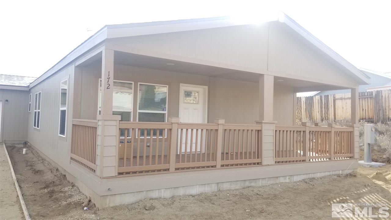 172 Hoge Road Reno, NV 89506 - Photo 3 of 17 a view of a house with a small yard