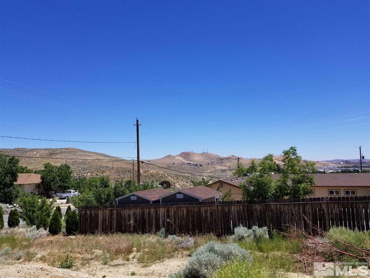 172 Hoge Road Reno, NV 89506 - Photo 8 of 17 a view of a house with a backyard