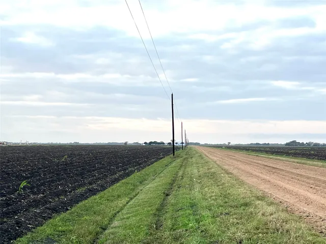a view of a lake with a big yard