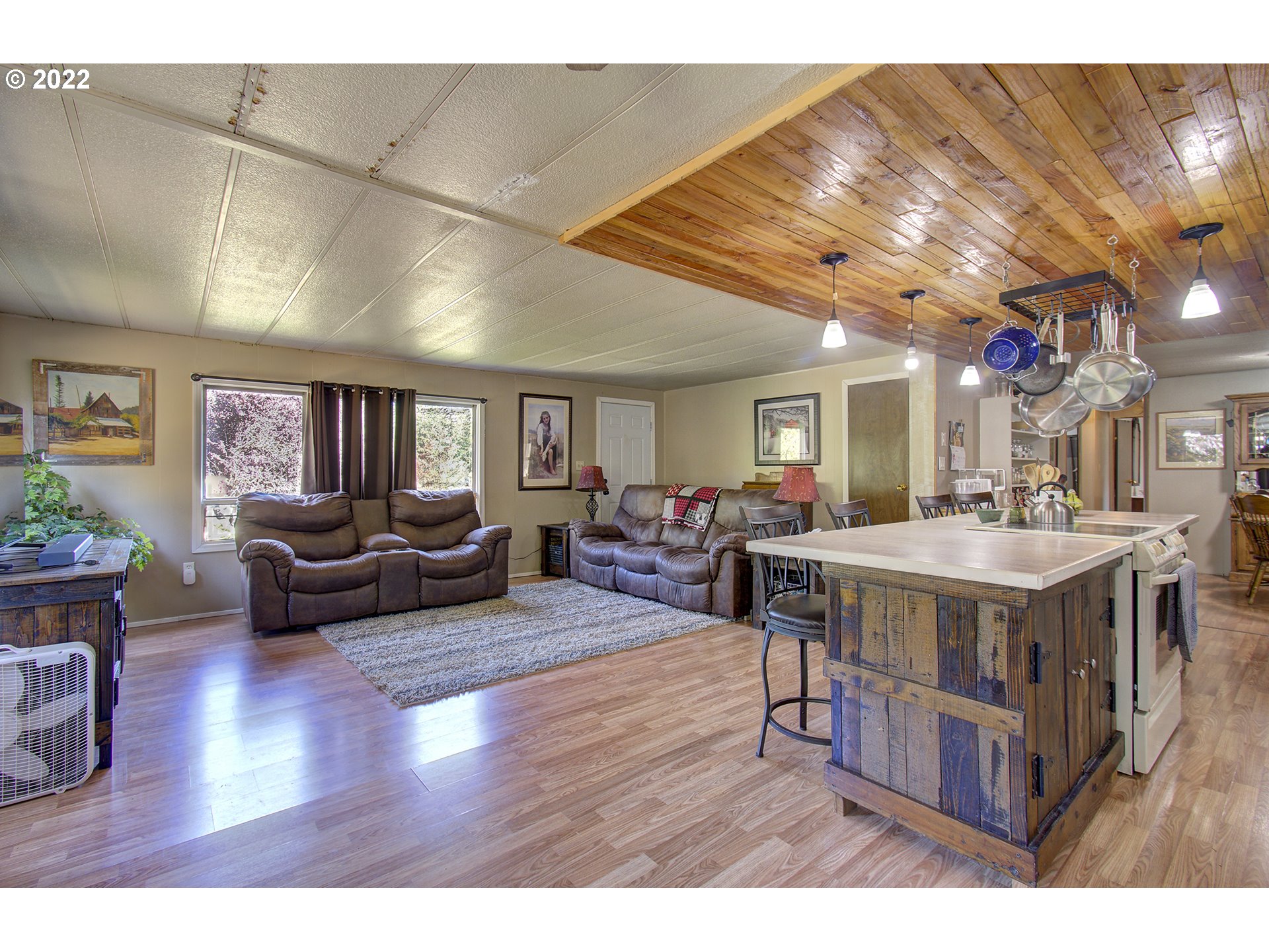 24402 Cox Road Rainier, OR 97048 - Photo 3 of 32 a living room with furniture and a wooden floor