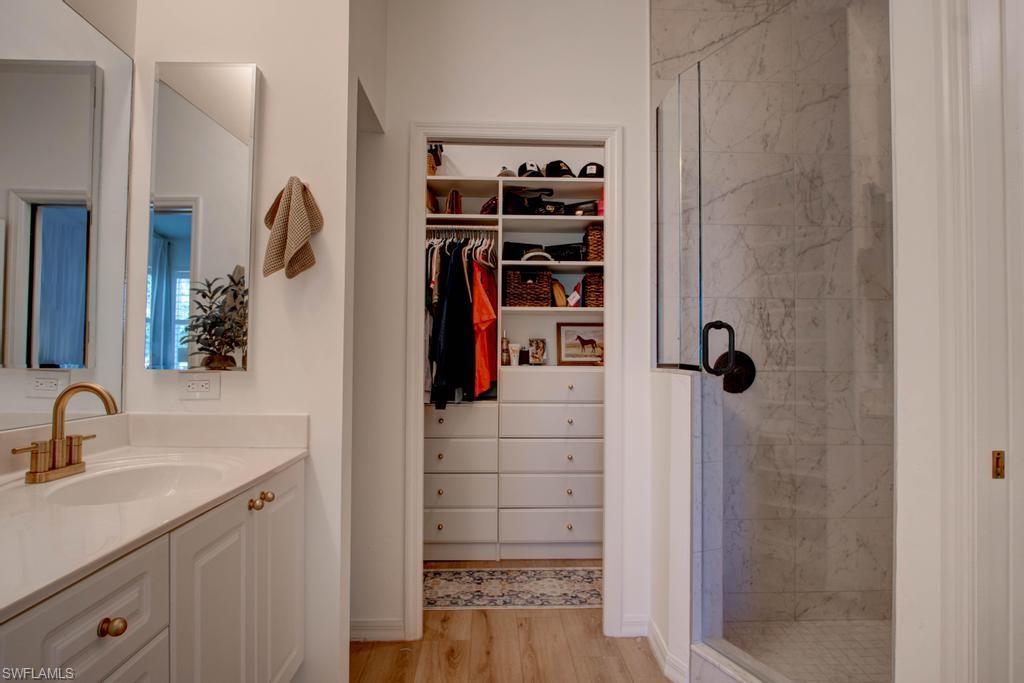 1969 Crestview Way, Unit 152 Naples, FL 34119 - Photo 16 of 35 a bathroom with a shower