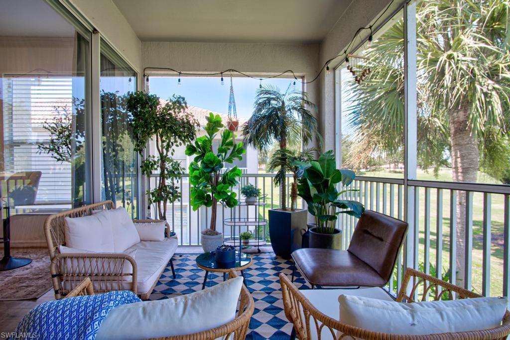 1969 Crestview Way, Unit 152 Naples, FL 34119 - Photo 28 of 35 a living room with furniture and a potted plant
