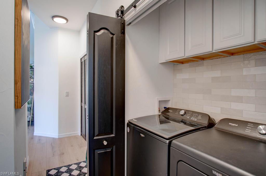 1969 Crestview Way, Unit 152 Naples, FL 34119 - Photo 32 of 35 a close view of a sink and cabinets