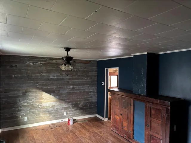 a view of hall way with wooden floor