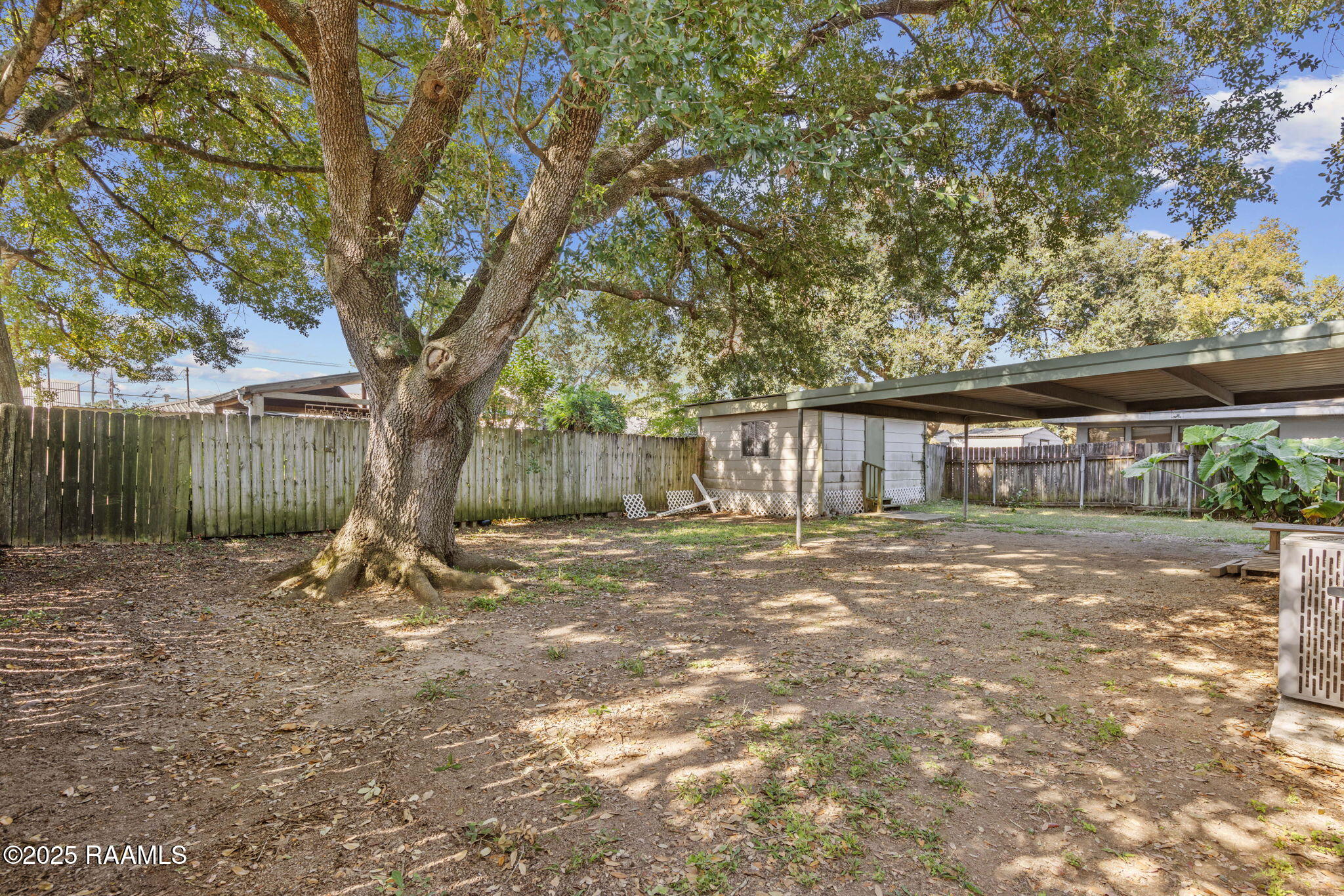 504 3rd Street Broussard, LA 70518 - Photo 18 of 24 Backyard with mature trees