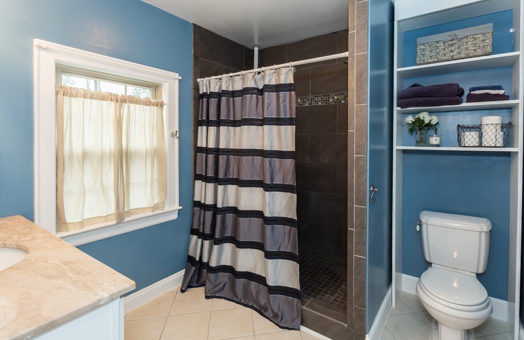 23 Mayflower Road Needham, MA 02492 - Photo 15 of 17 a bathroom with a toilet and a shower