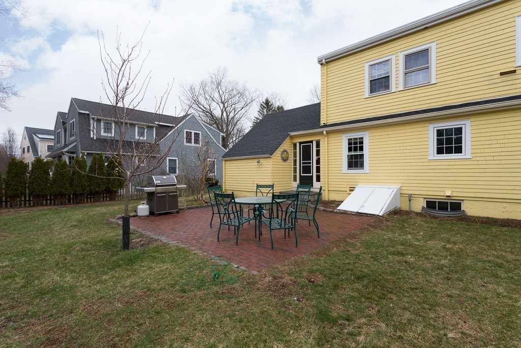 23 Mayflower Road Needham, MA 02492 - Photo 17 of 17 a view of a house with a backyard