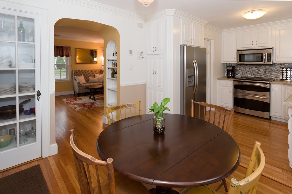 23 Mayflower Road Needham, MA 02492 - Photo 4 of 17 a dining room with furniture and wooden floor