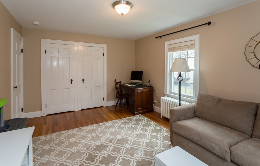 23 Mayflower Road Needham, MA 02492 - Photo 6 of 17 a bedroom with furniture and a window