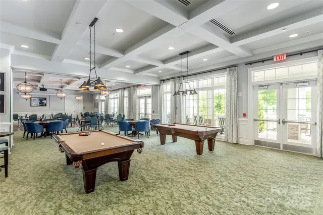 a outdoor space with lots of furniture and windows