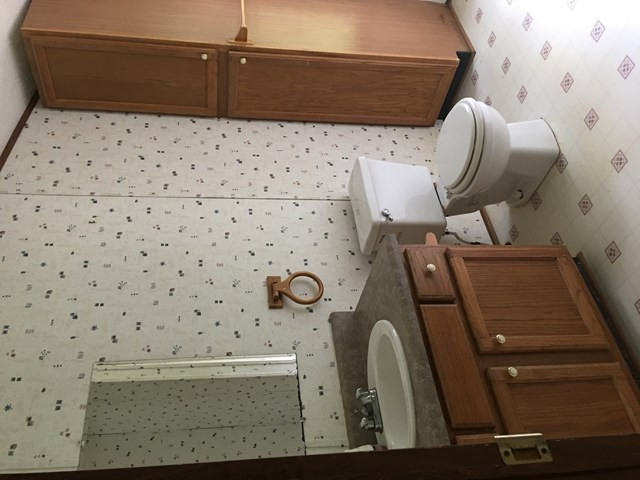 16 Garrett Road Edgefield, SC 29824 - Photo 9 of 13 a bathroom with a sink and mirror