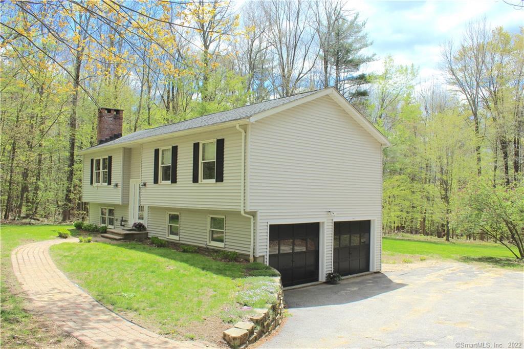 31 Bohun Road Colebrook, CT 06021 - Photo 1 of 1 a view of a house with a yard patio and a fire pit