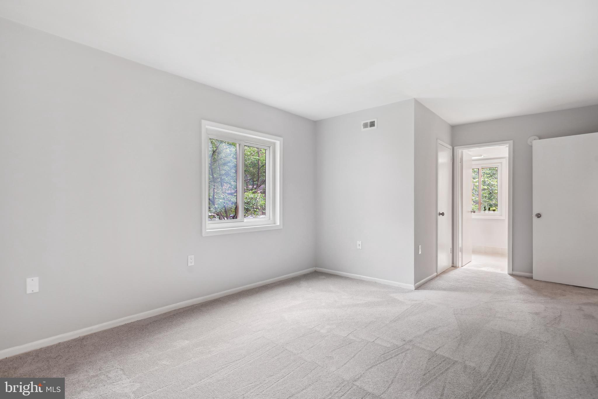 1525 Northgate Square, Unit 12C Reston, VA 20190 - Photo 17 of 23 Primary Suite