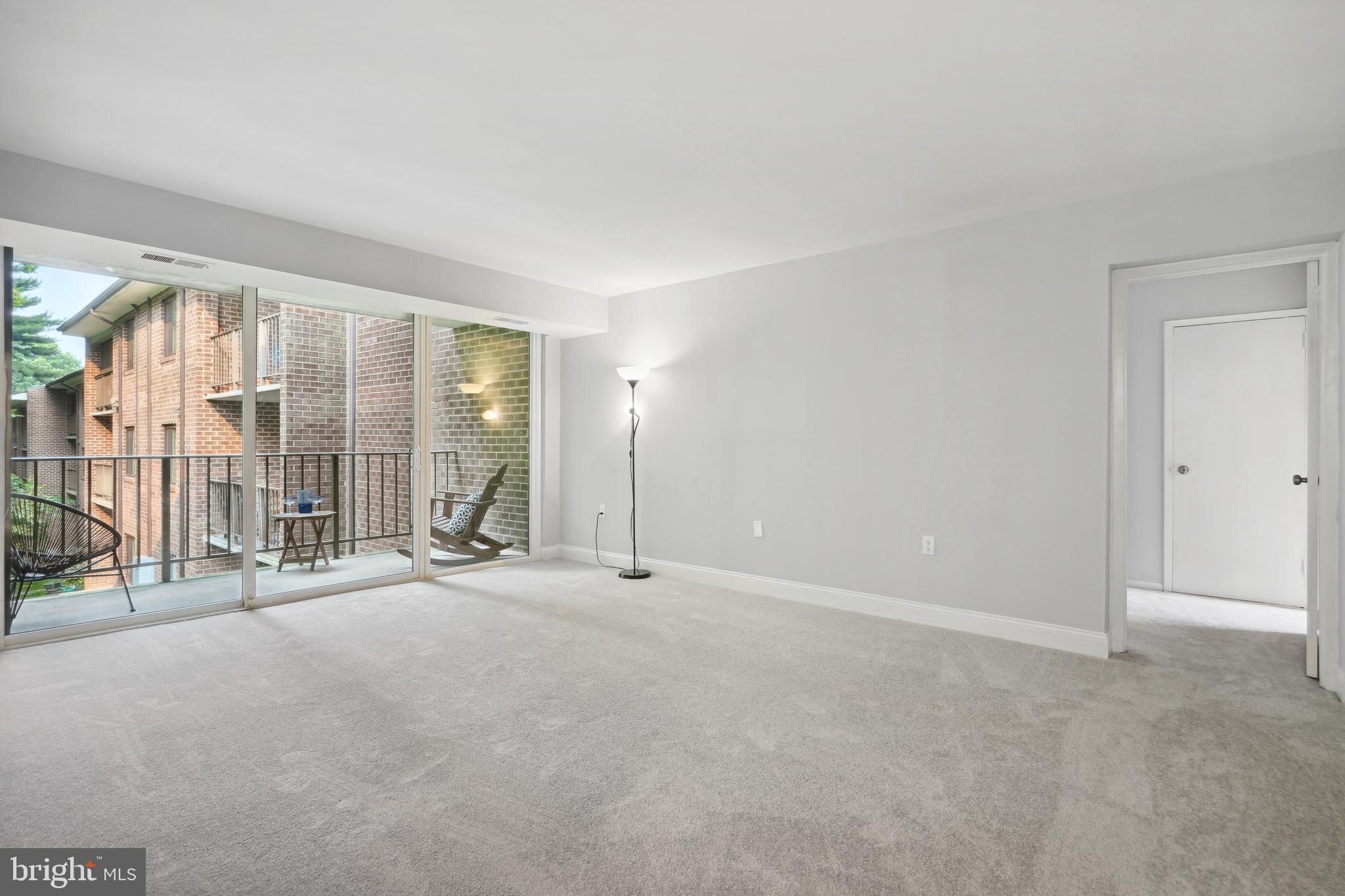 1525 Northgate Square, Unit 12C Reston, VA 20190 - Photo 2 of 23 Large Living Room - New Carpet throughout