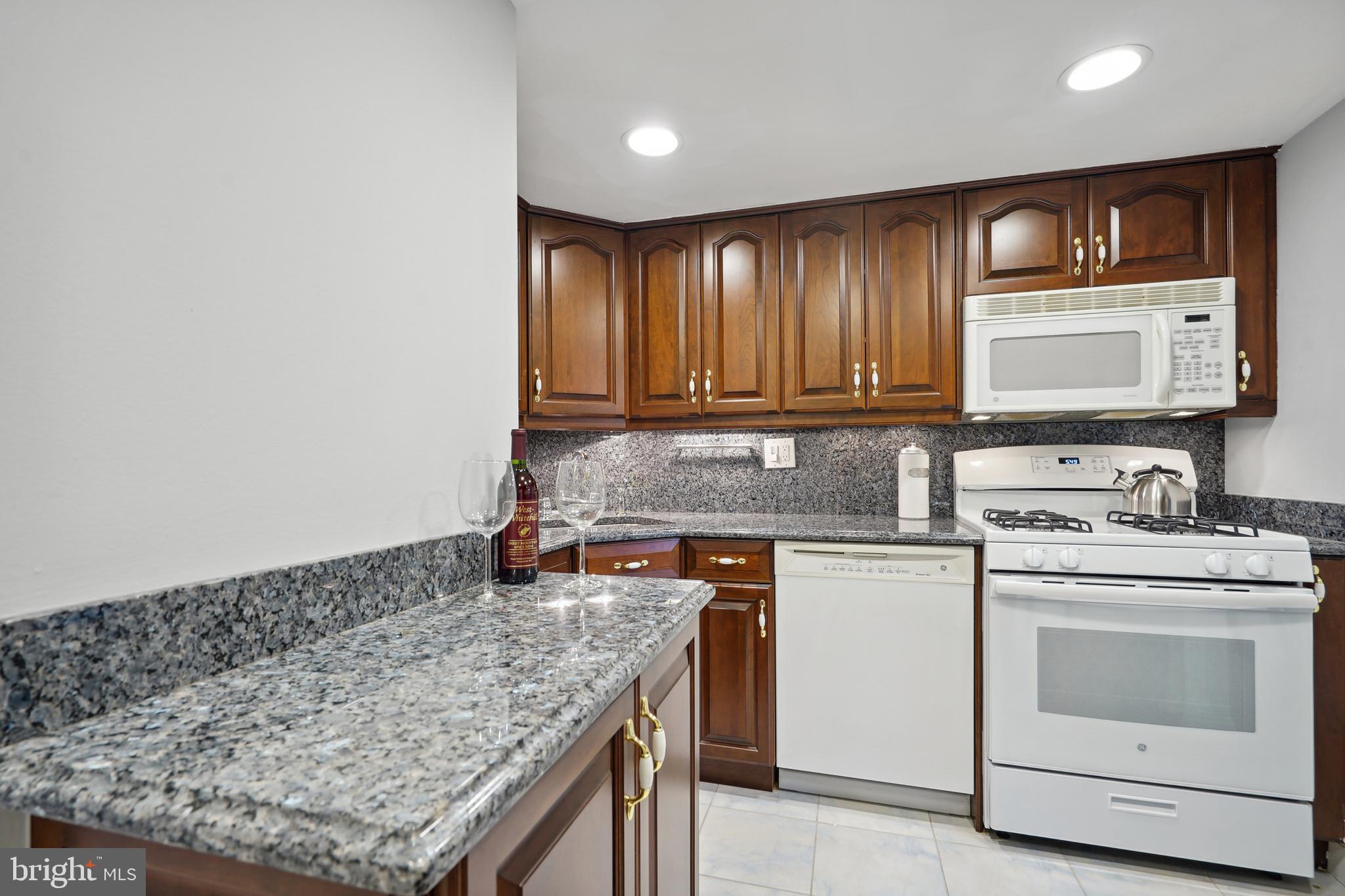 1525 Northgate Square, Unit 12C Reston, VA 20190 - Photo 7 of 23 Updated Kitchen with High End Cabinetry