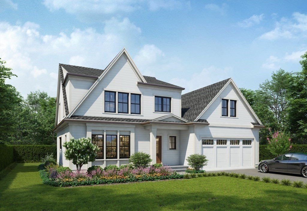 106 Horrigan Drive, Unit 21 Dedham, MA 02026 - Photo 1 of 32 a front view of a house with a yard and garage