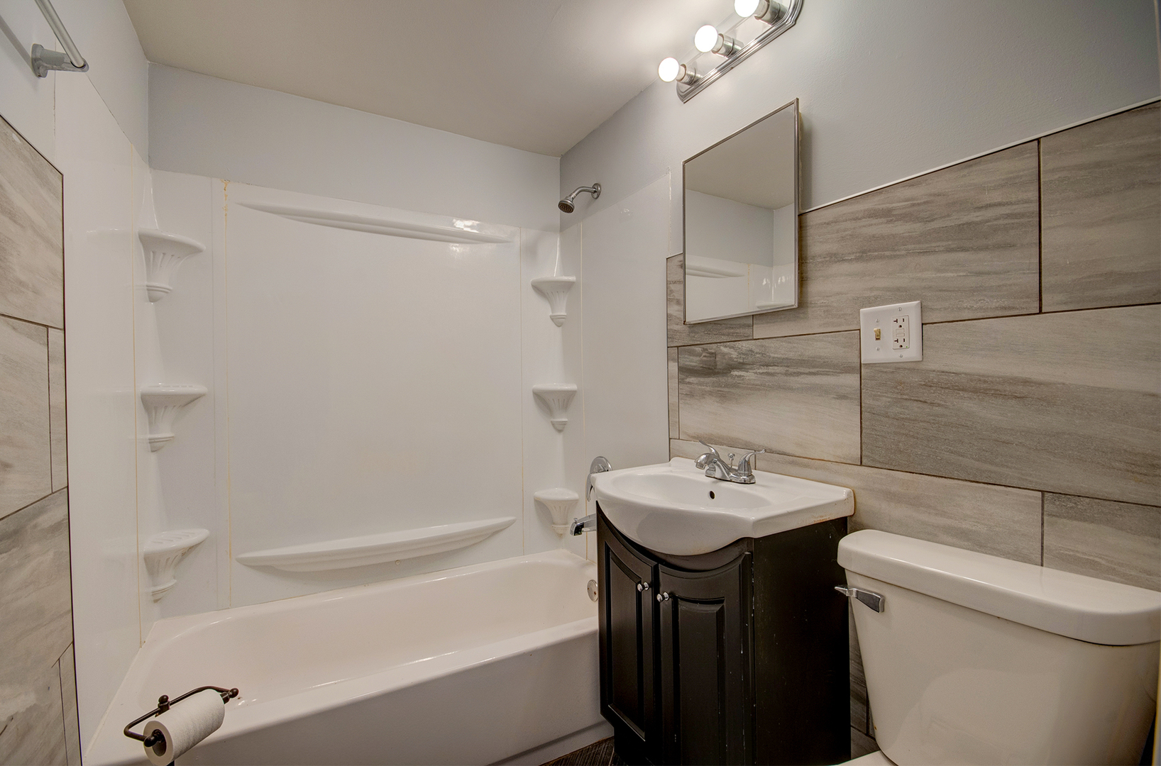 2024 Plainfield Road Crest Hill, IL 60403 - Photo 16 of 20 a bathroom with a sink toilet and shower