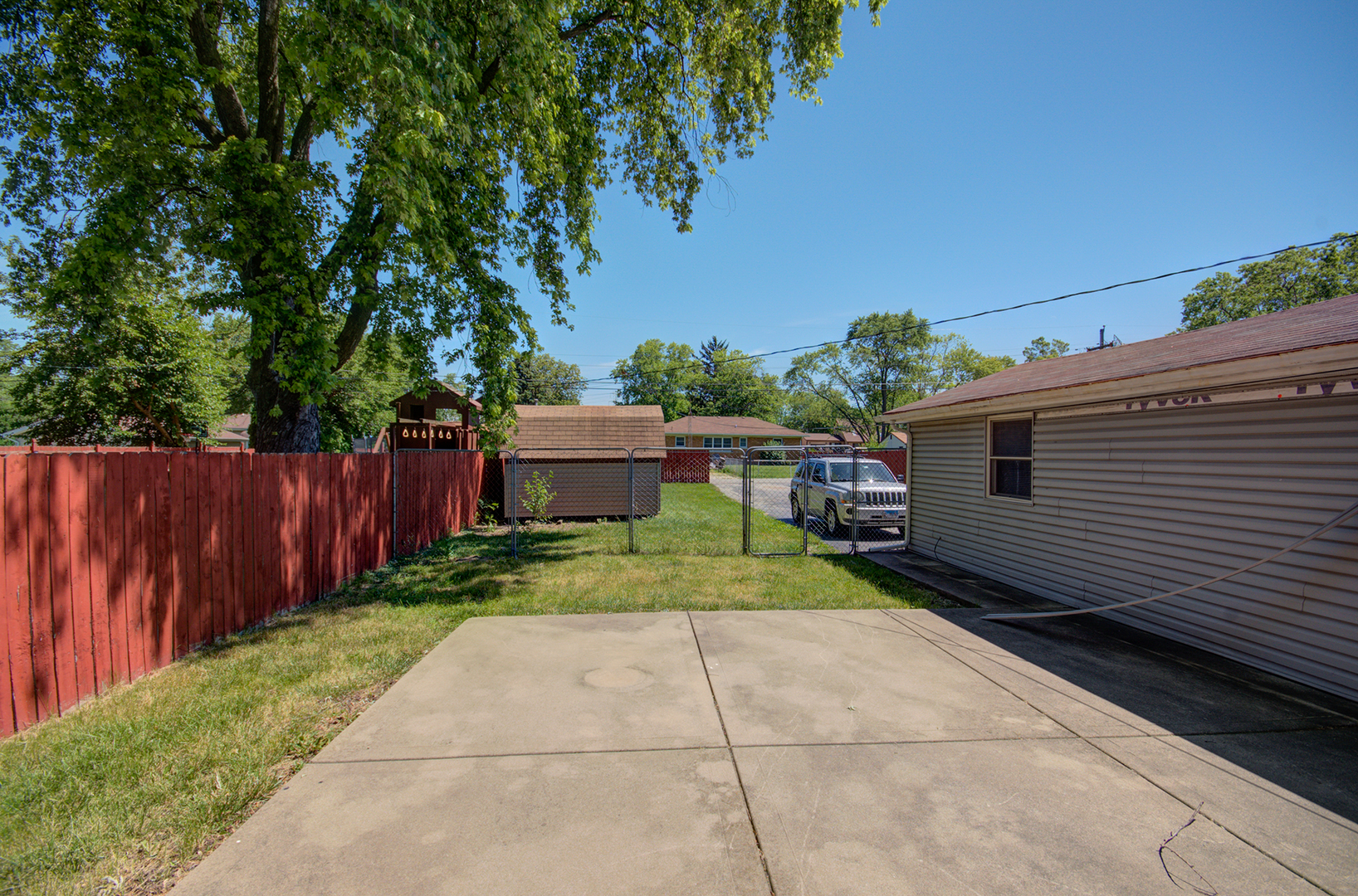 2024 Plainfield Road Crest Hill, IL 60403 - Photo 18 of 20 a backyard of a house with lots of green space