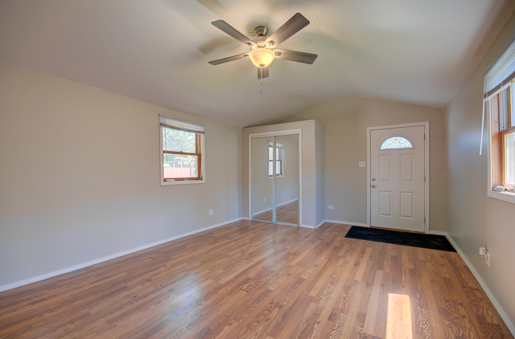2024 Plainfield Road Crest Hill, IL 60403 - Photo 2 of 20 wooden floor in an empty room with a window