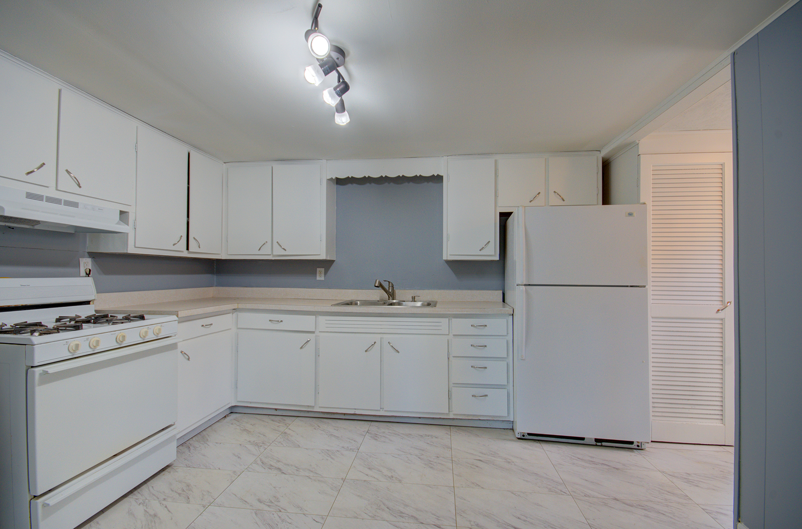 2024 Plainfield Road Crest Hill, IL 60403 - Photo 4 of 20 a kitchen with cabinets stainless steel appliances and sink