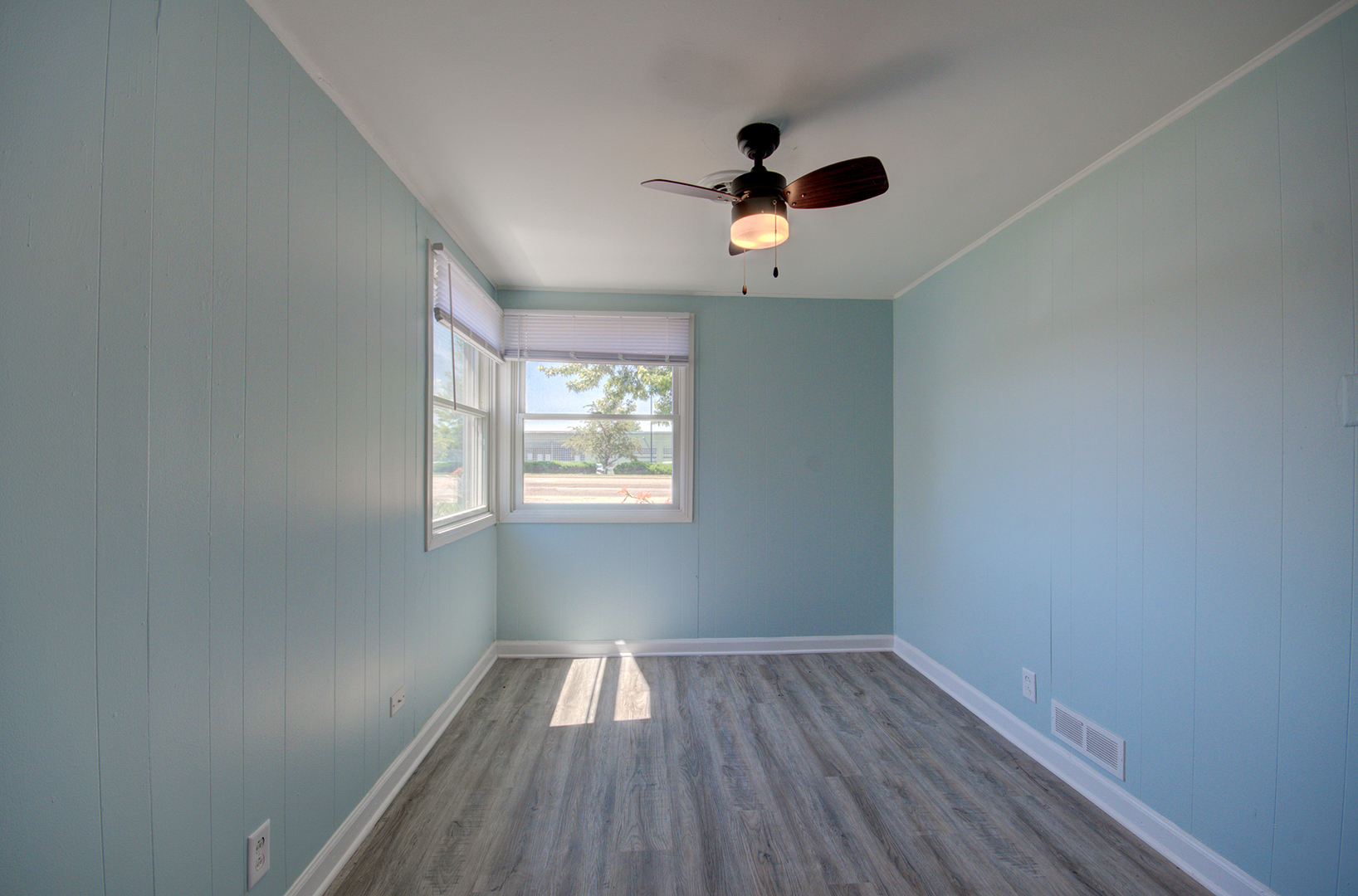 2024 Plainfield Road Crest Hill, IL 60403 - Photo 6 of 20 an empty room with a window and a fan