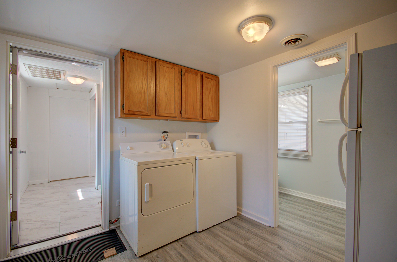 2024 Plainfield Road Crest Hill, IL 60403 - Photo 10 of 20 a utility room with cabinets washer and dryer