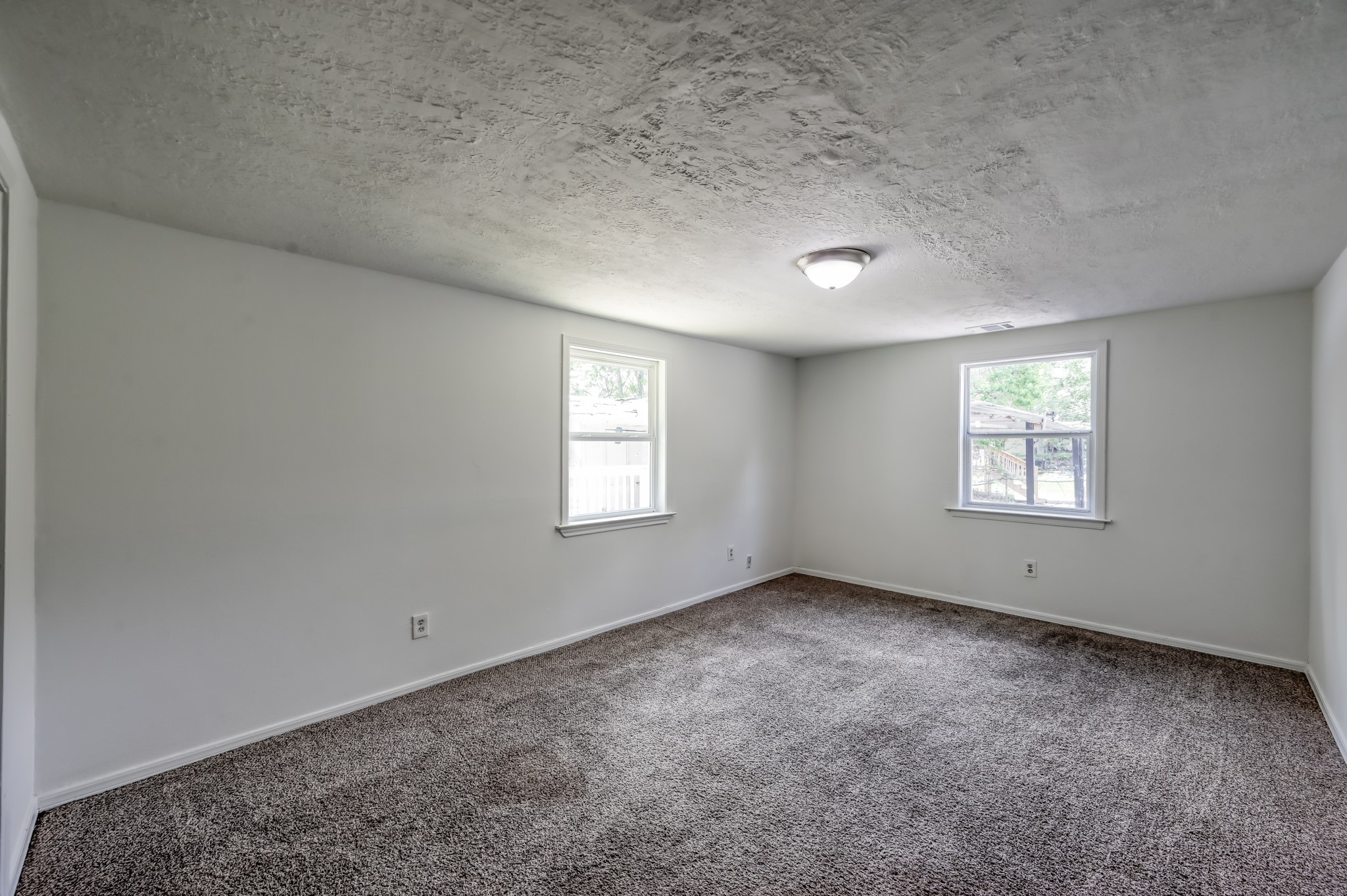 29906 Hunters, Unit B Magnolia, TX 77355 - Photo 13 of 25 an empty room with a window