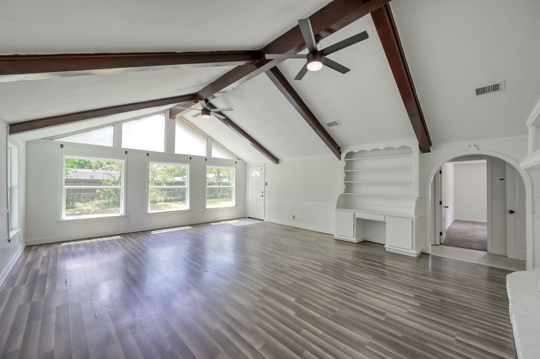 29906 Hunters, Unit B Magnolia, TX 77355 - Photo 5 of 25 a view of empty room with wooden floor and fan