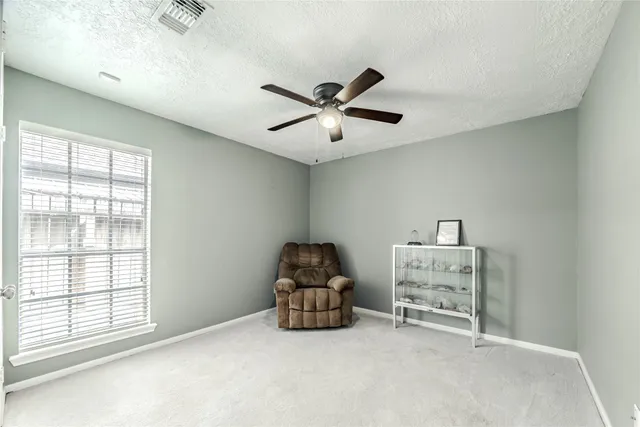 a room with furniture and window