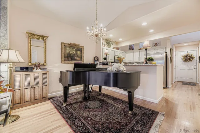 a living room with lots of furniture and a rug