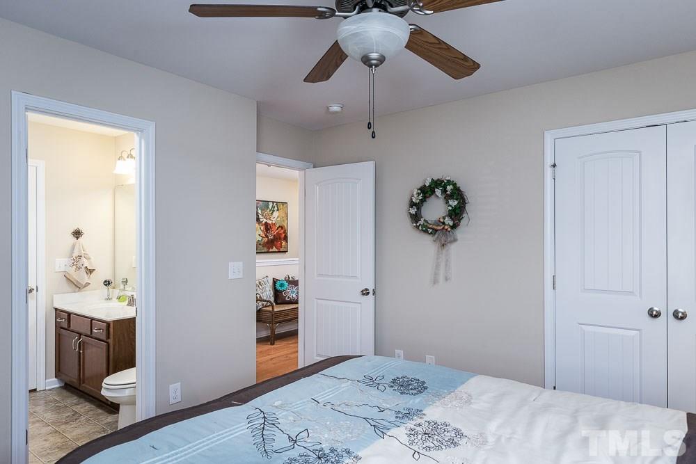 1310 Still Monument Way Raleigh, NC 27603 - Photo 19 of 27 Double doors on your extra deep closet!