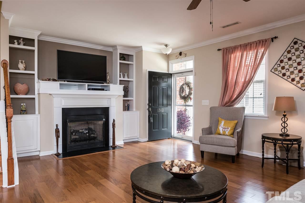 Comfortable elegance with luxury built in bookcases and a gas fireplace!