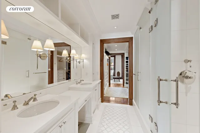 a balcony with table and chairs