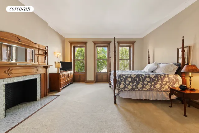 a spacious bathroom with a granite countertop sink mirror and vanity
