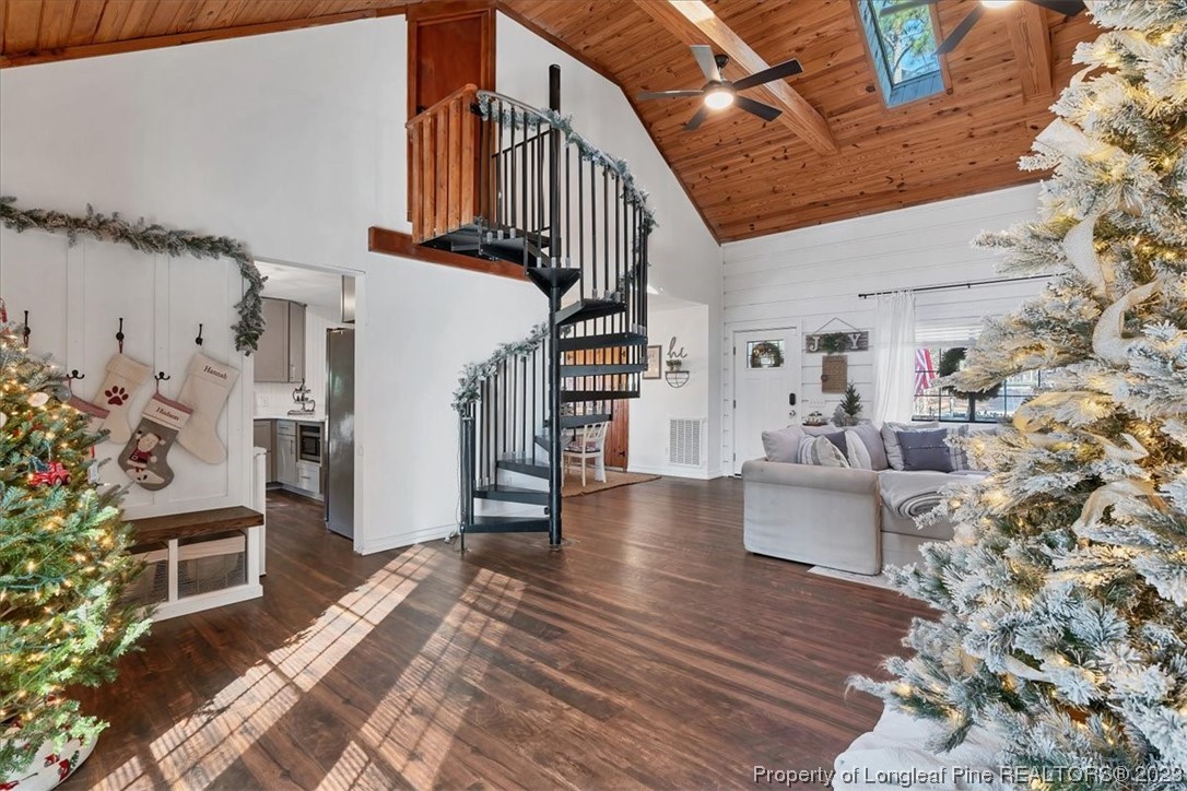 8199 Calloway Road Aberdeen, NC 28315 - Photo 11 of 50 a view of entryway and hall with wooden floor