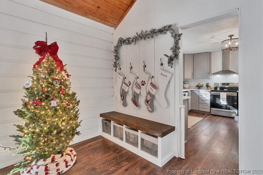 8199 Calloway Road Aberdeen, NC 28315 - Photo 12 of 50 a view of a room with wooden floor and entryway