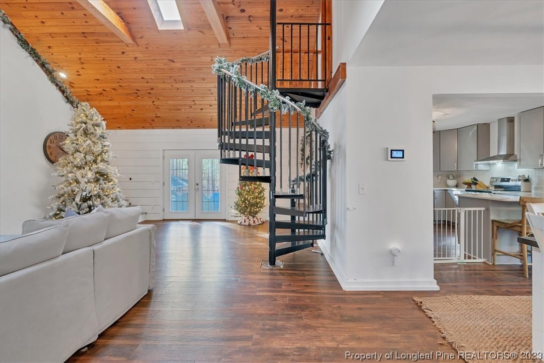 8199 Calloway Road Aberdeen, NC 28315 - Photo 32 of 50 a view of entryway and hall with wooden floor