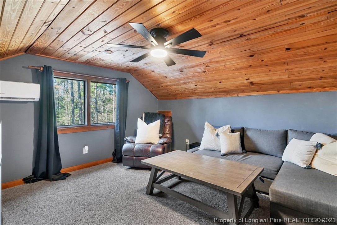 8199 Calloway Road Aberdeen, NC 28315 - Photo 39 of 50 a bedroom with furniture and window
