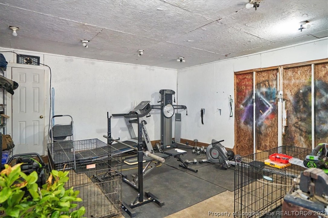 8199 Calloway Road Aberdeen, NC 28315 - Photo 44 of 50 a view of a room with gym equipment