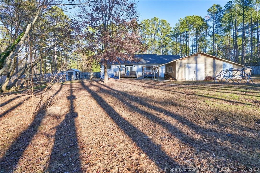 8199 Calloway Road Aberdeen, NC 28315 - Photo 50 of 50 a view of house with outdoor space and sitting area